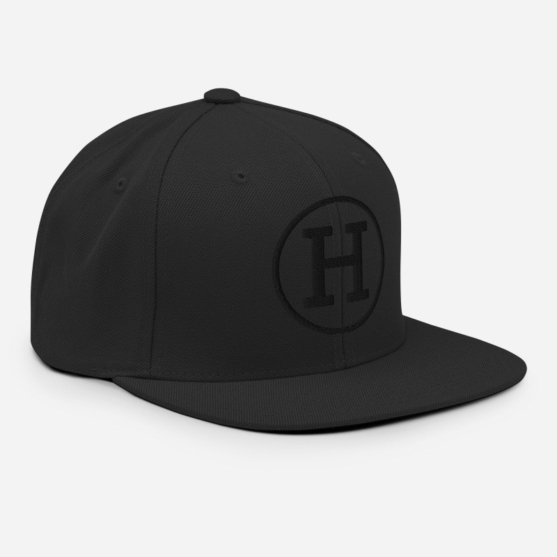 A black snapback hat with the logo for certified-haters.com embroidered on the front of the hat